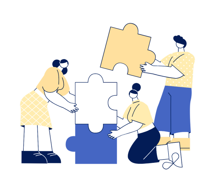 Drei Menschen setzen Puzzleteile zusammen.